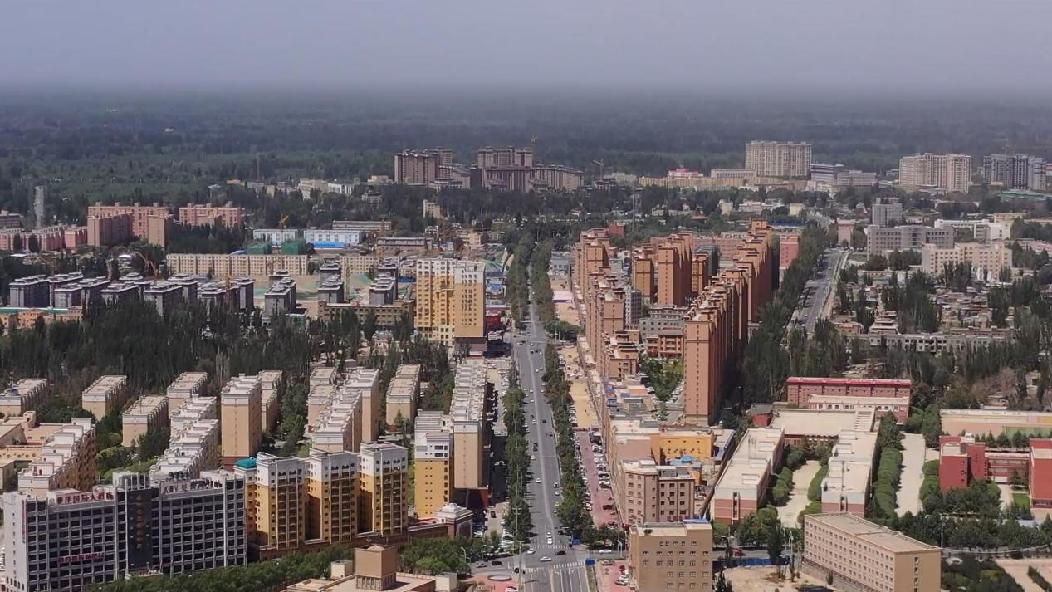 墨玉县城长大了,变宽了,长高了,十层以上的楼房有了上百栋